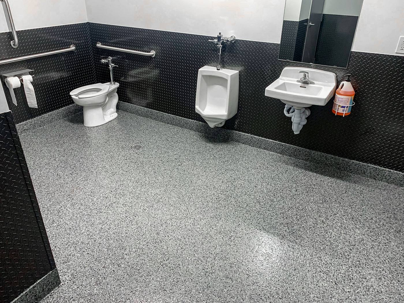 Coated commercial restroom floor