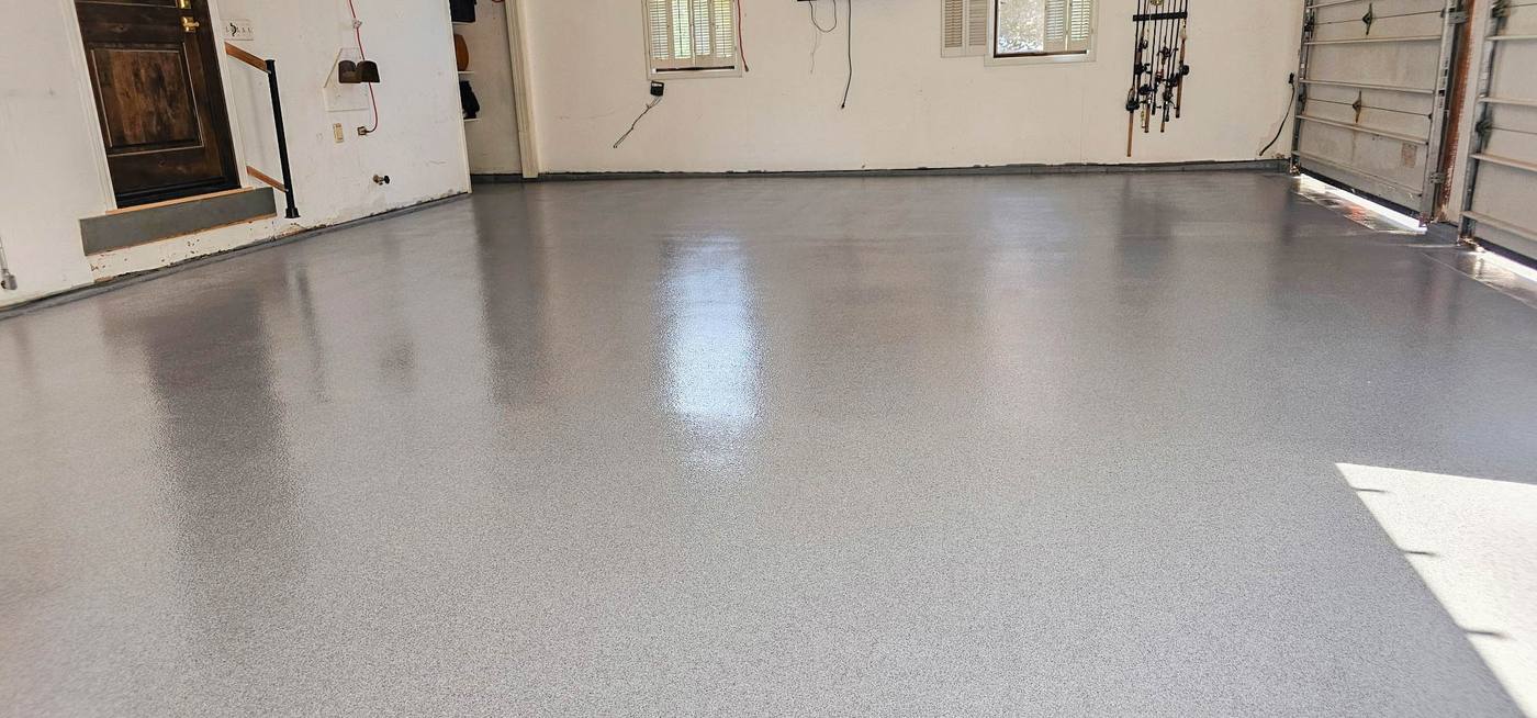 Flake coating from garage to driveway